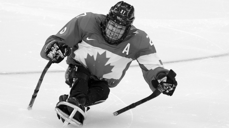 Para Hockey Athlete Playing Para Ice Hockey BW
